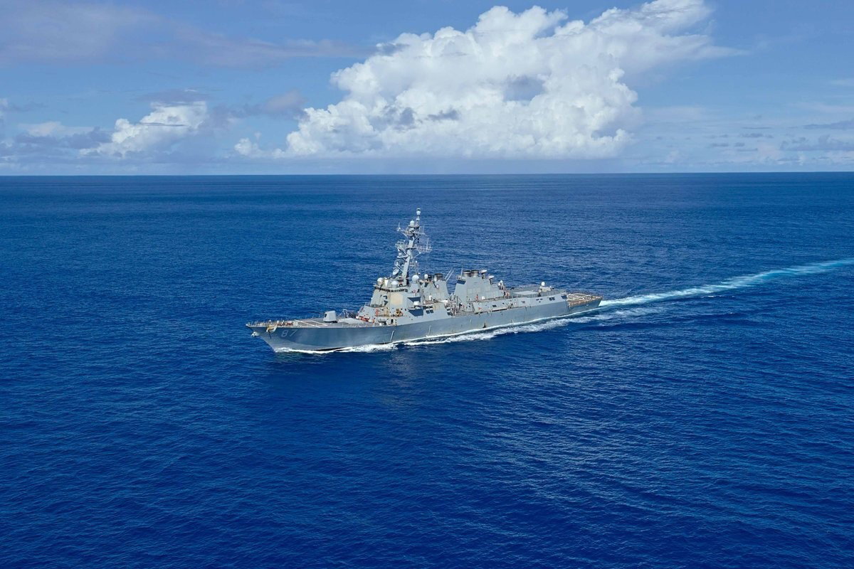 A destroyer cruises in the ocean.