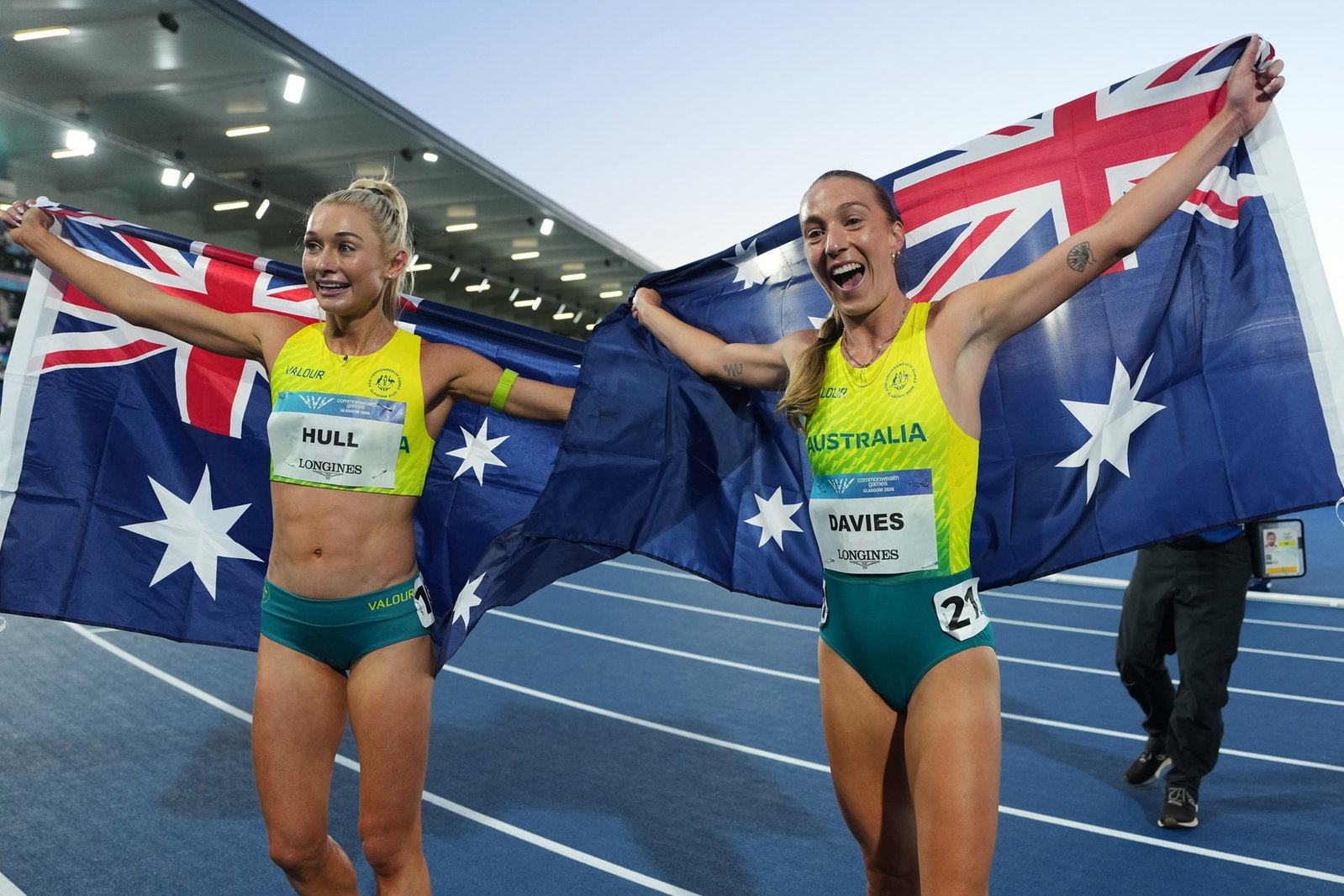 Jess Hull and Rose Davies with Australian flags.
