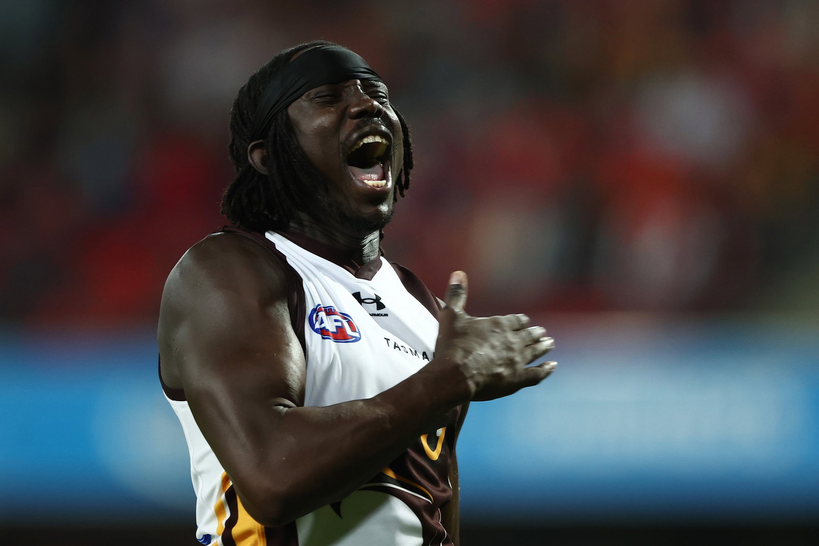 Mabior Chol of the Hawks celebrates a goal during the round 15 AFL match between Gold Coast Suns and Hawthorn Hawks on June 19, 2026, in Gold Coast, Australia.