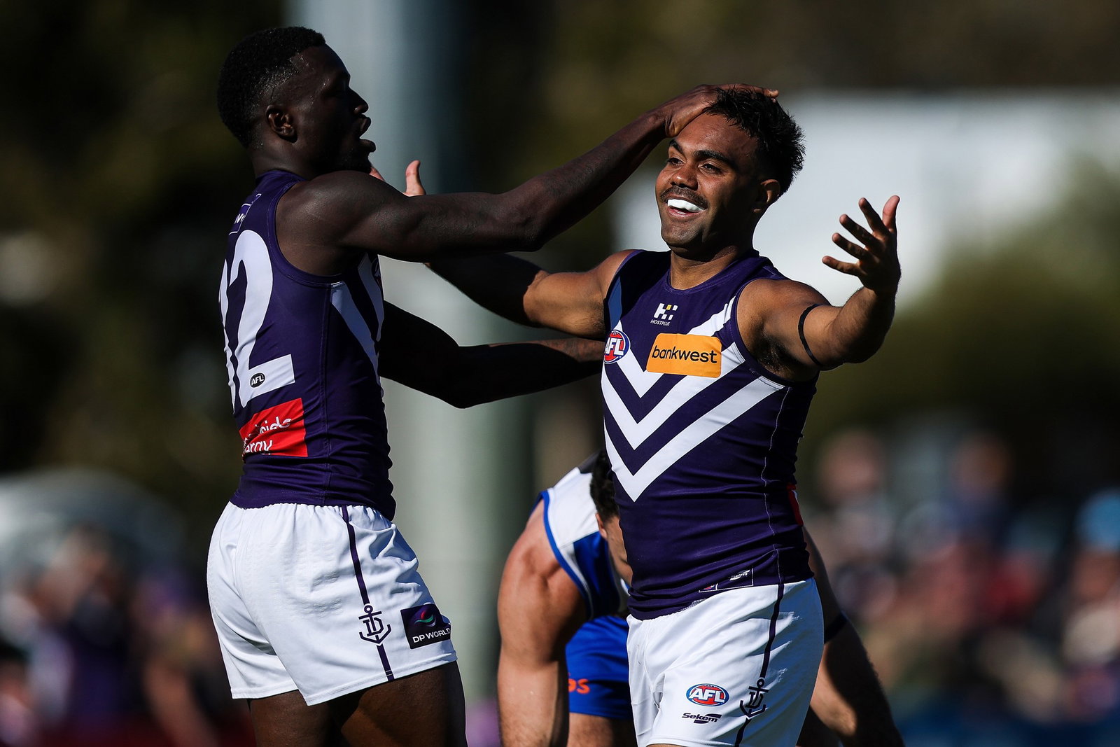  Isaiah Dudley of the Dockers celebrates a goal with Michael Frederick during the 2026 AFL Round 13 match between the North Melbourne Kangaroos and the Fremantle Dockers at Hands Oval on June 6, 2026 in Bunbury, Australia.