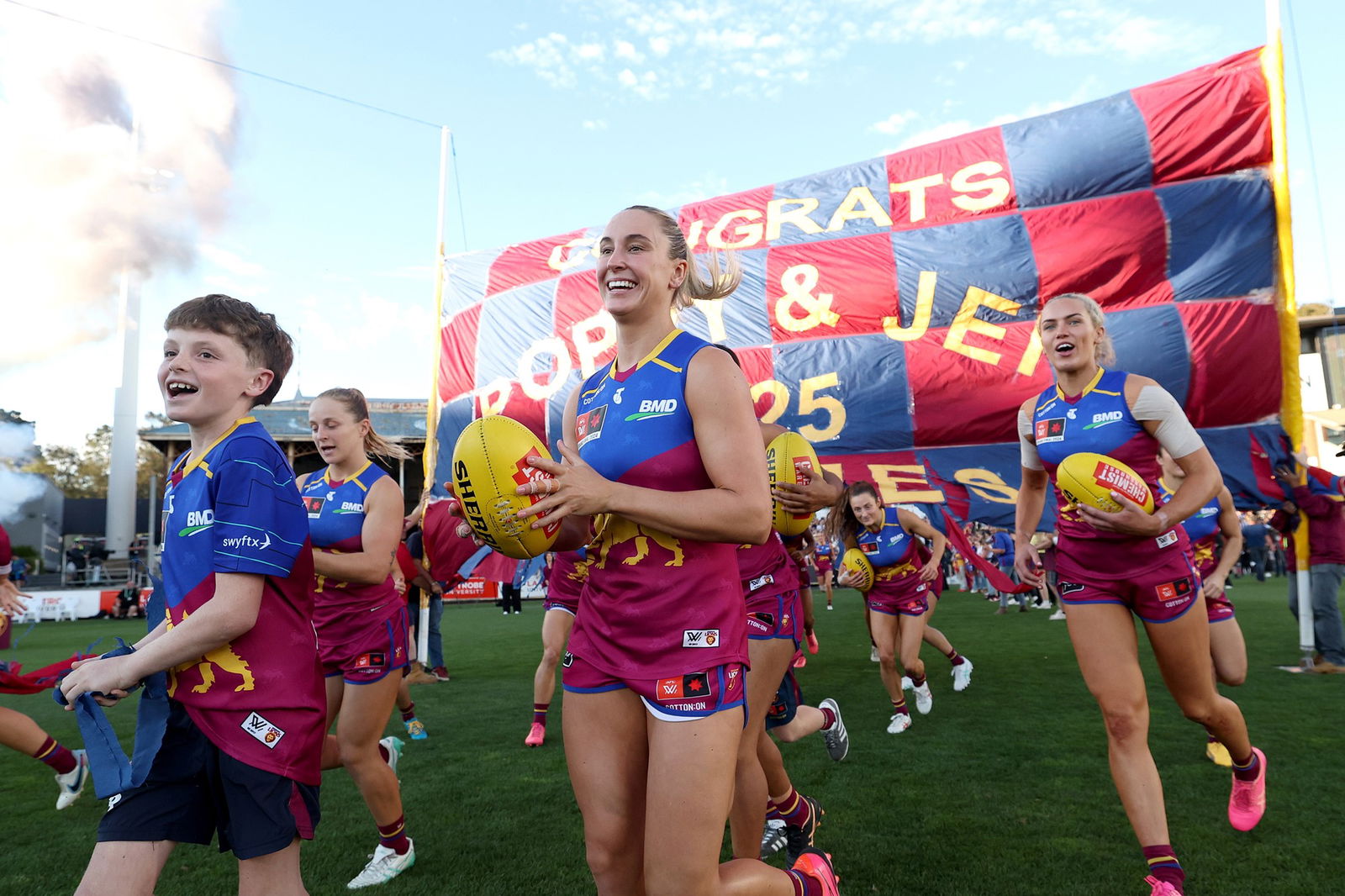 Brisbane players enter the field