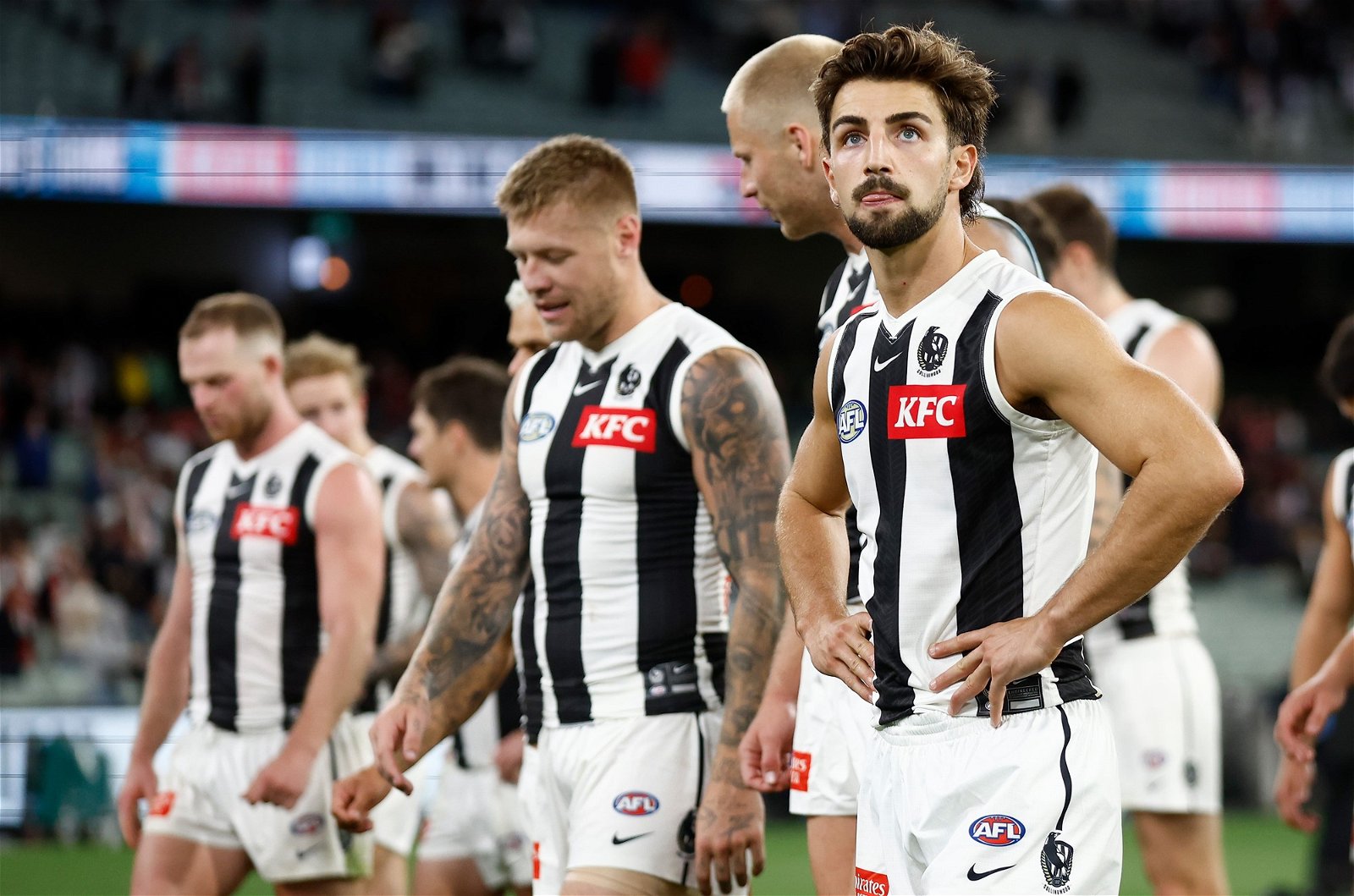 Disappointed Collingwood players