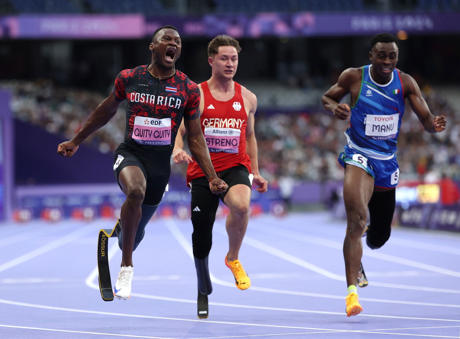 Sherman Isidro Guity Guity of Team Costa Rica (L) celebrates during the Men's 100m - T64 Final