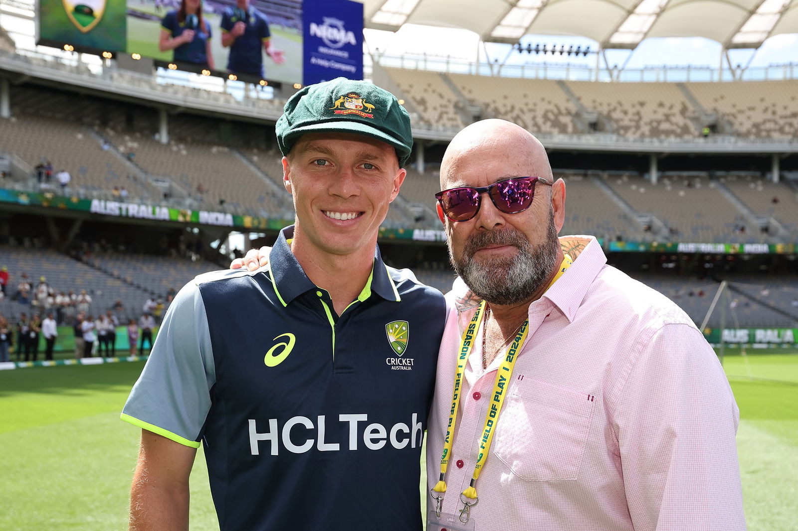 Nathan McSweeney stands with Darren Lehmann after receiving his baggy green Test cap.