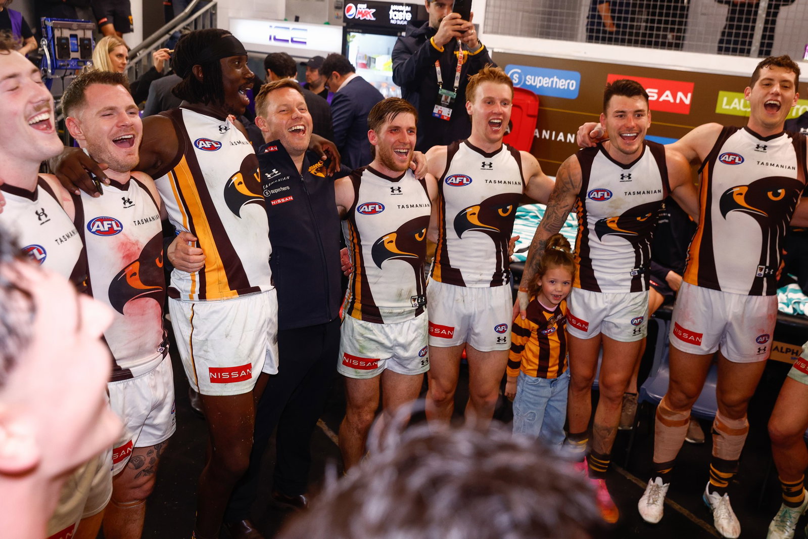 Hawthorn sing the team song following the 2026 AFL Round 15 match between the Gold Coast Suns and the Hawthorn Hawks on June 19, 2026 in the Gold Coast, Australia.