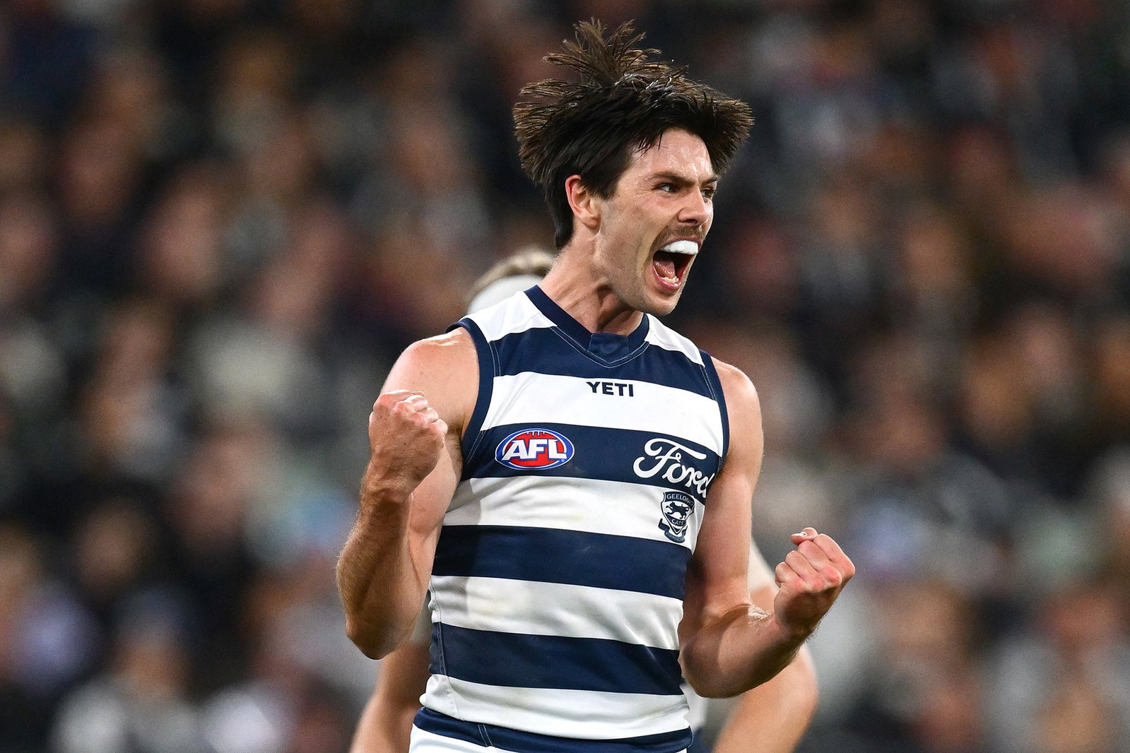 Ollie Henry kicked four goals as Geelong cruised to a 54-point win over Collingwood at the MCG.