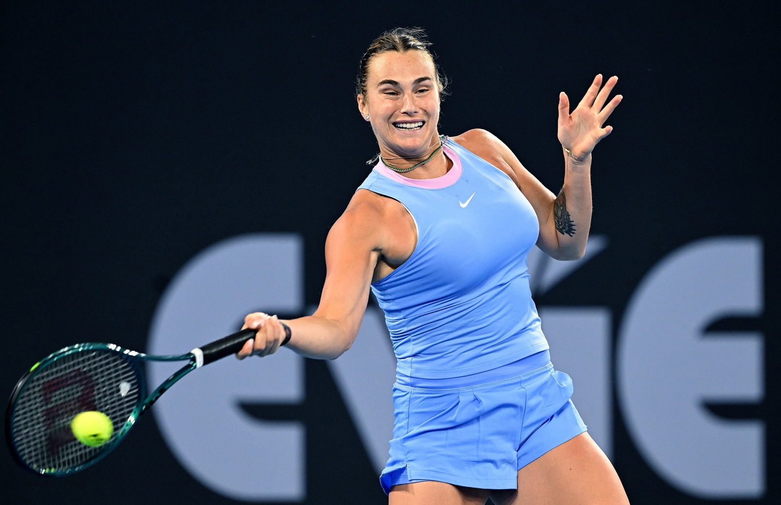 Aryna Sabalenka plays a forehand.