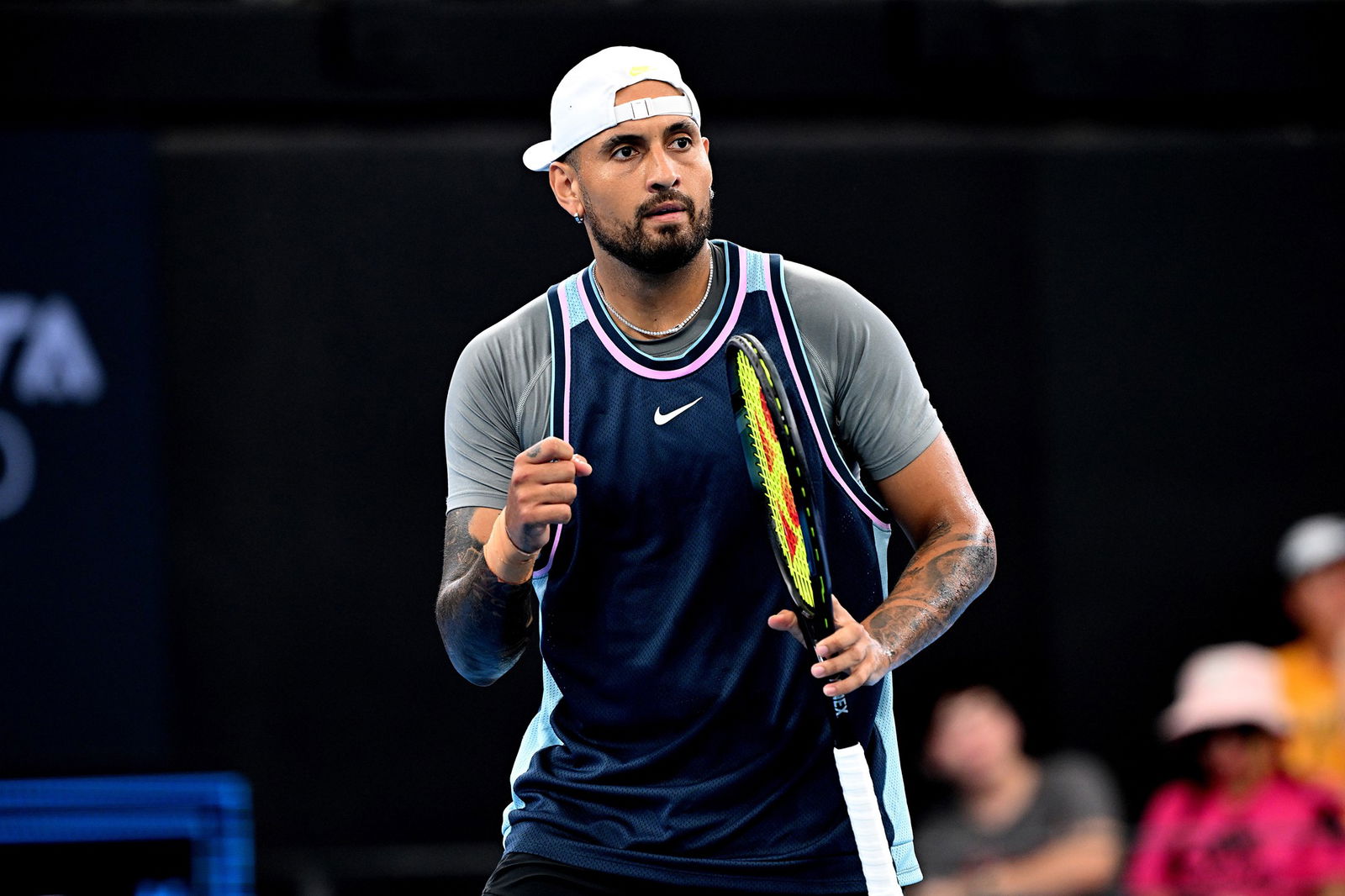 Nick Kyrgios pumps his right fist.