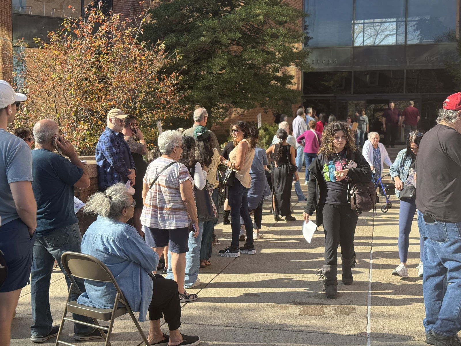 A long line of voters outside a polling station in Bucks County