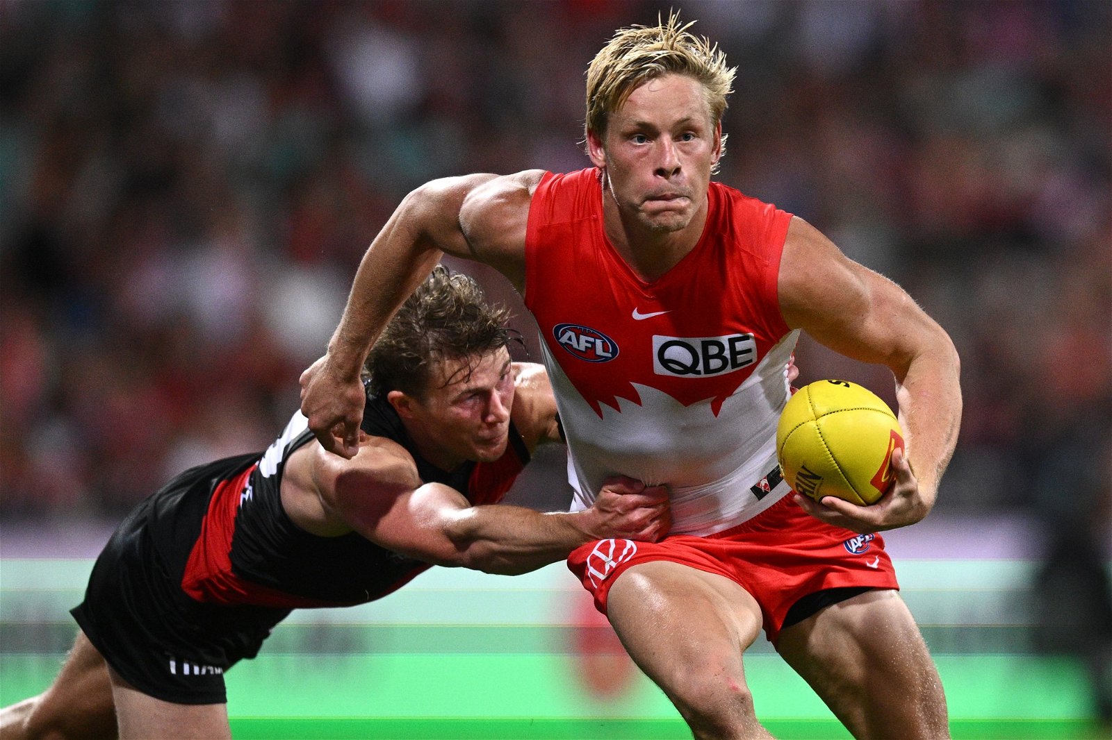 Isaac Heeney with the ball