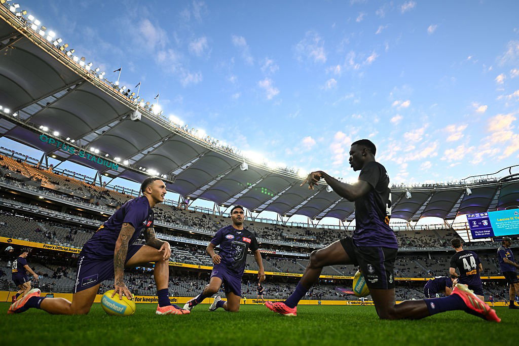 Freo players warm up