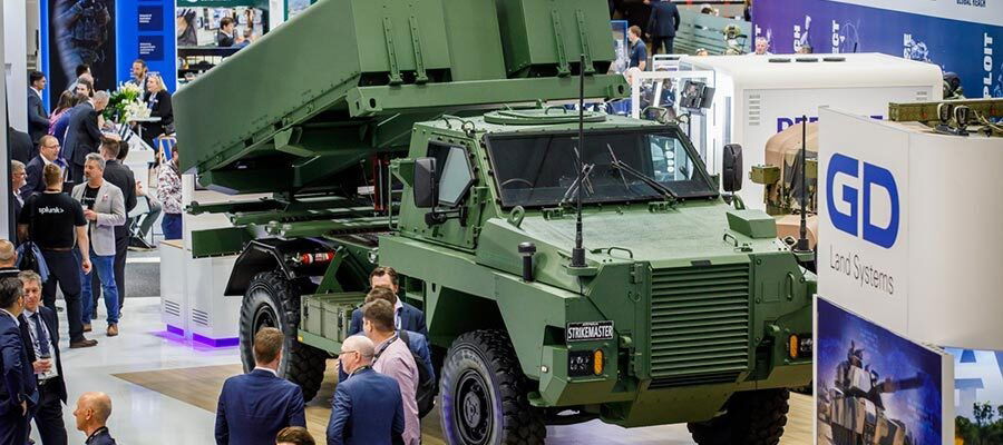 A military vehicle at an expo