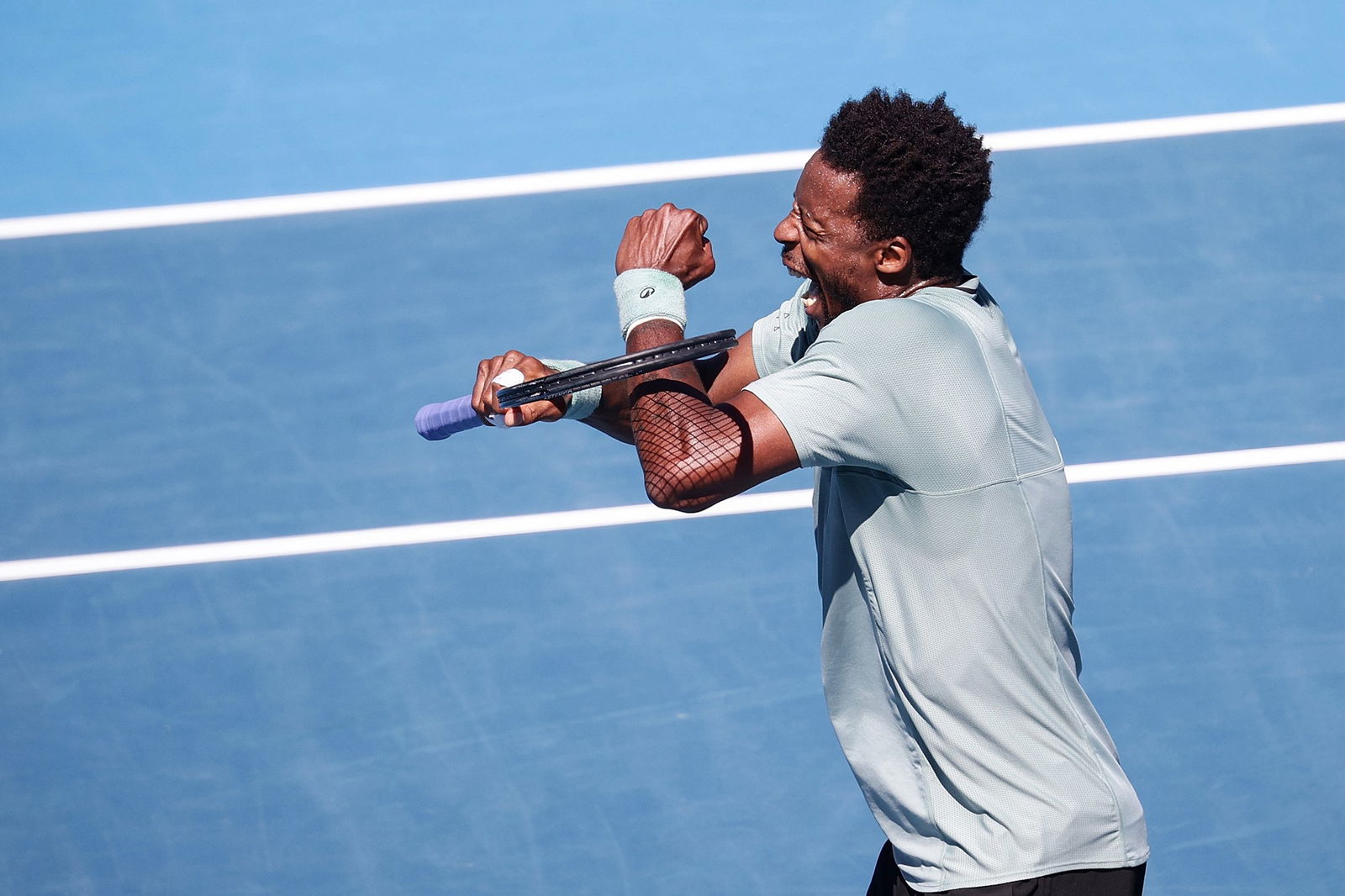 Gael Monfils celebrates winning the ASB Classic