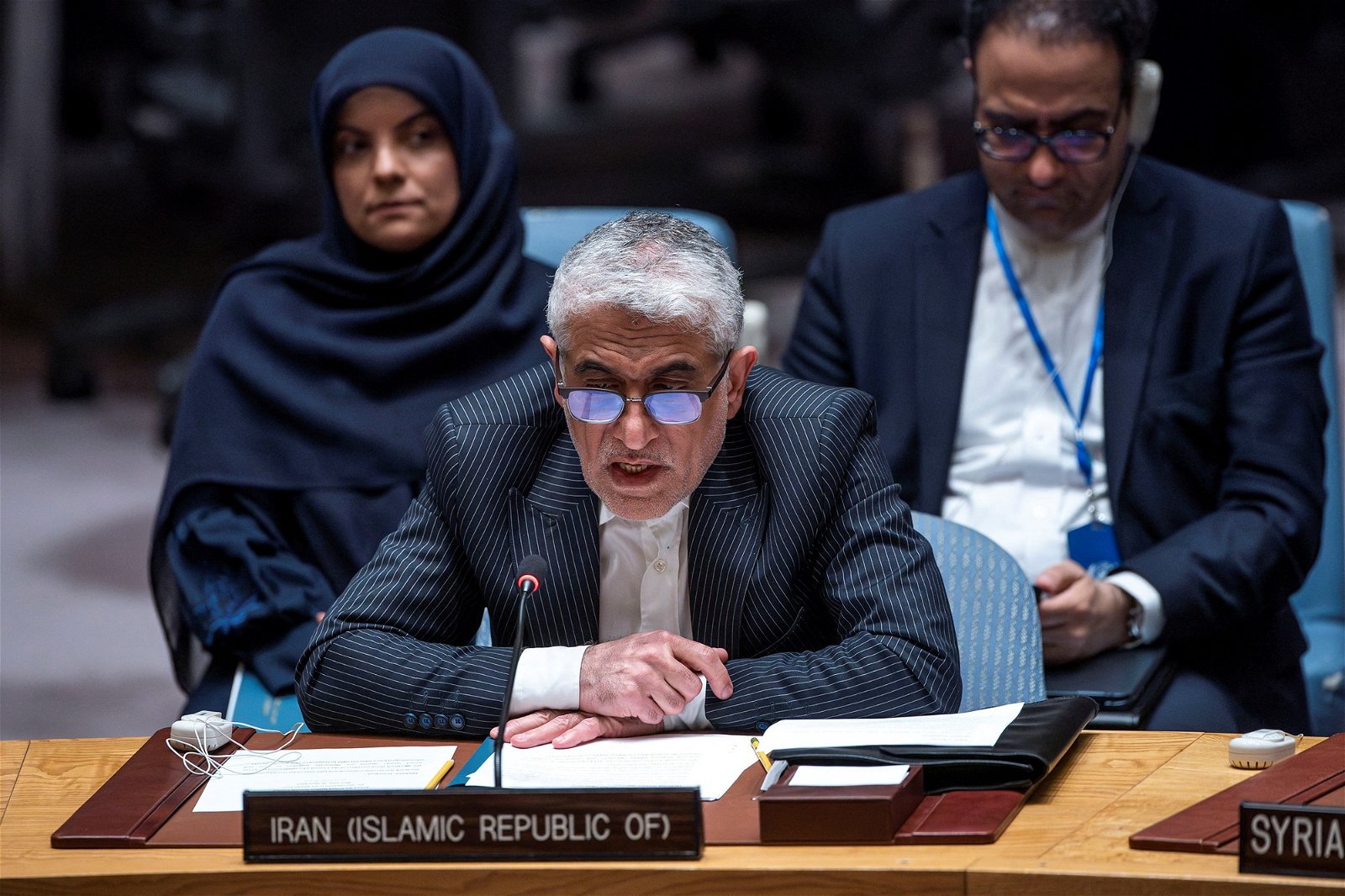 Amir Saeid Iravani sits at the Security Council desk and leans into the microphone