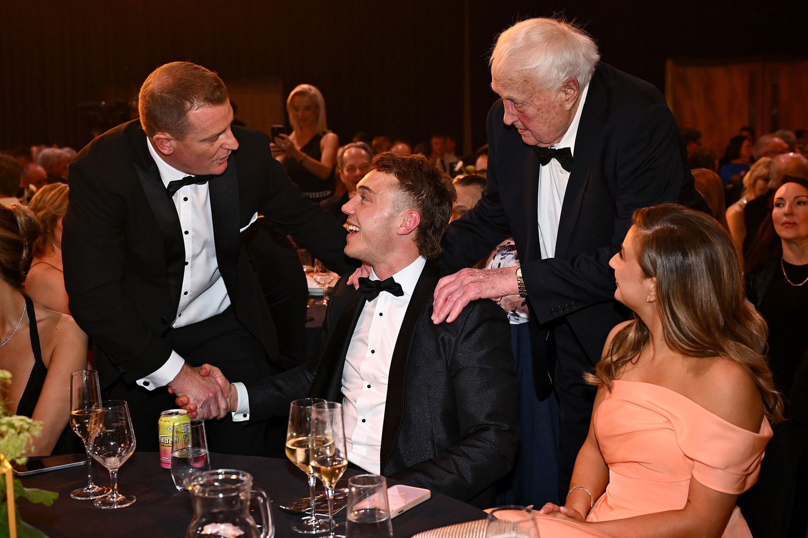 Patrick Cripps shakes hands with Michael Voss