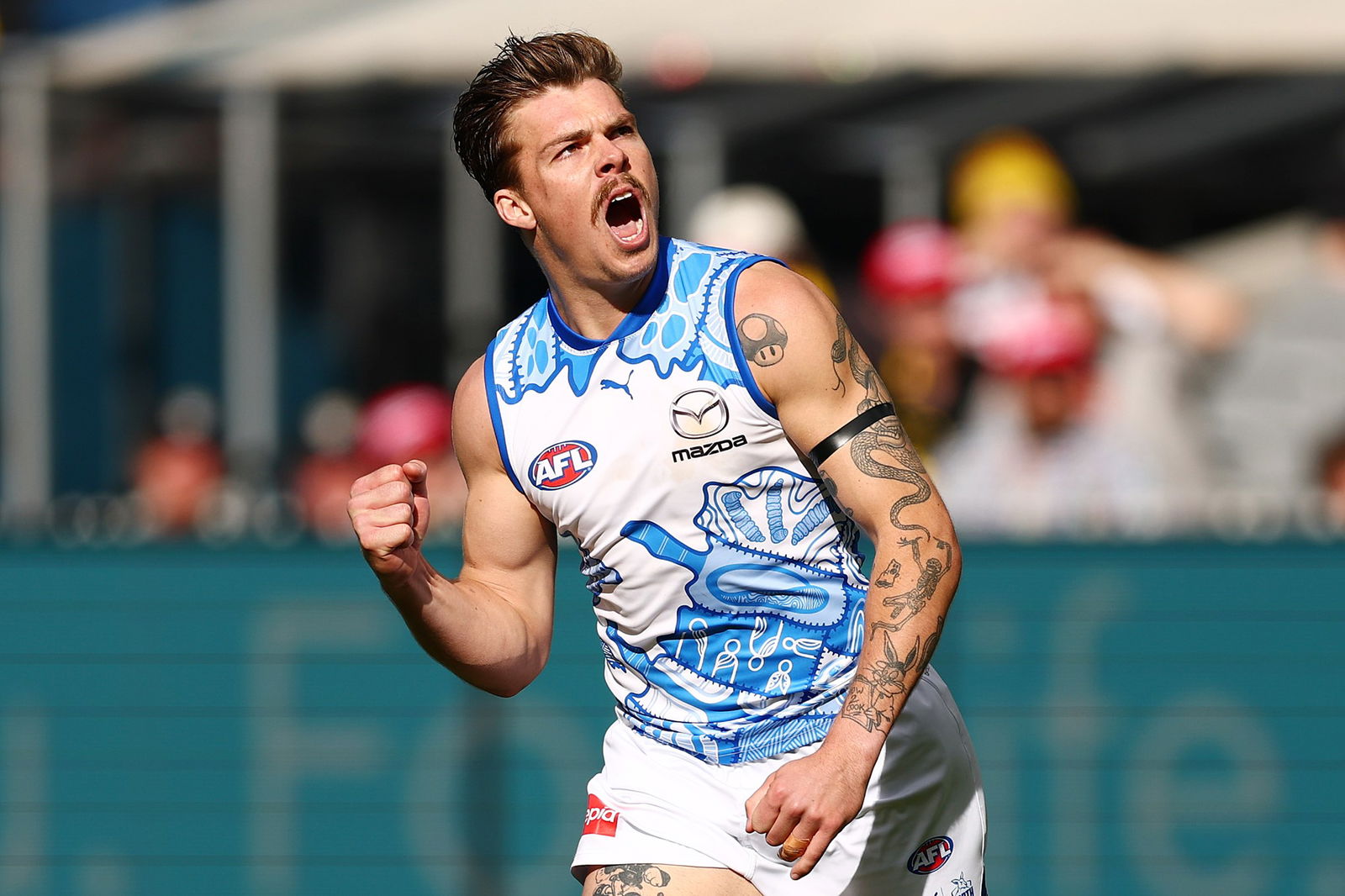 Cameron Zurhaar of the Kangaroos celebrates a goal during the round ten AFL match between Richmond Tigers and North Melbourne Kangaroos at Melbourne Cricket Ground, on May 18, 2025, in Melbourne, Australia.