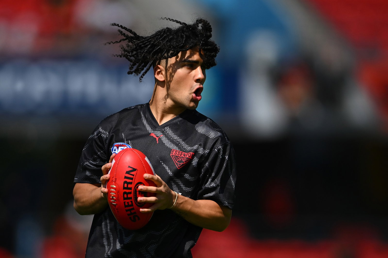 Isaac Kako warming up for the Bombers.