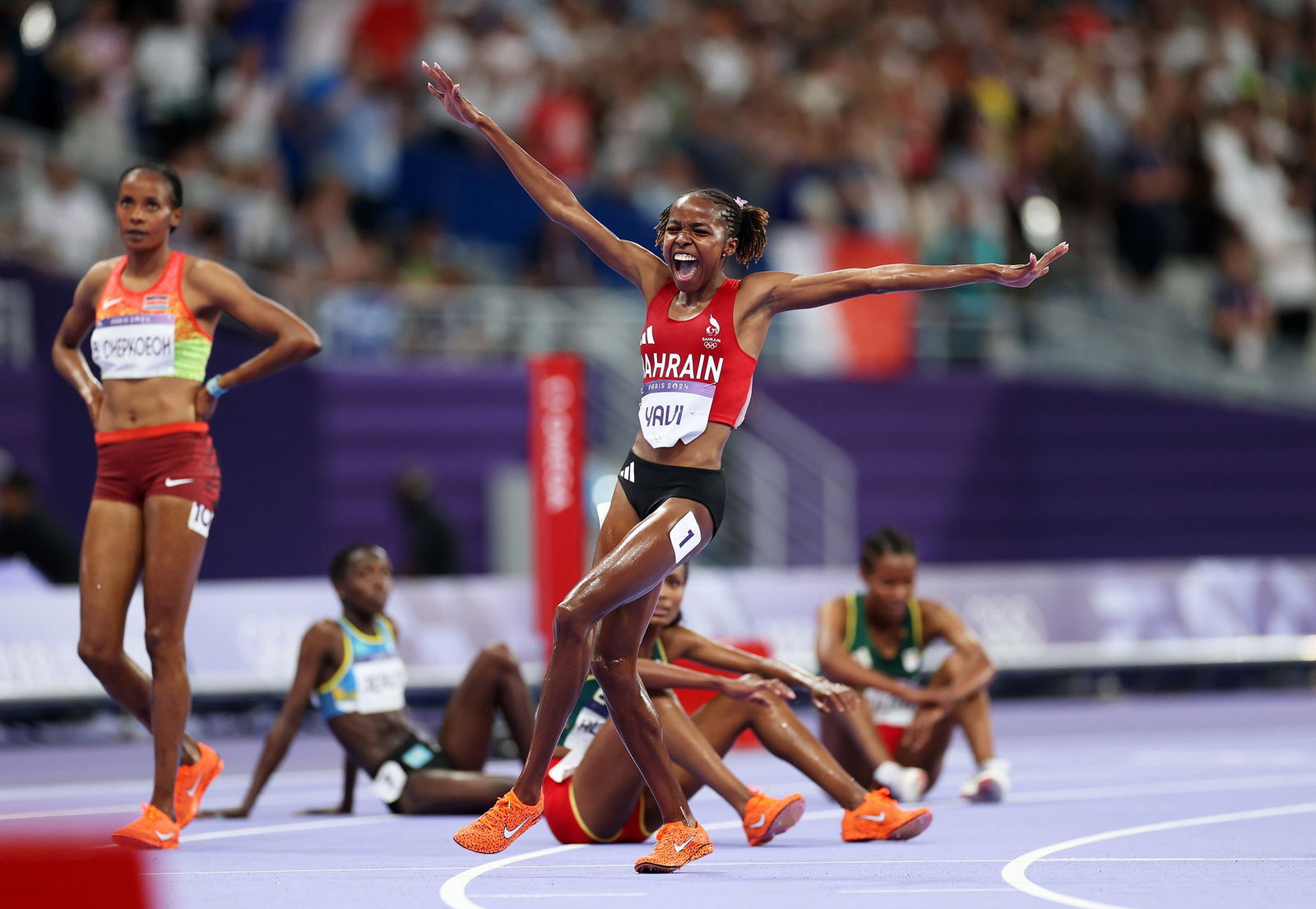 Winfred Yavi celebrates her win in the 3,000m steeplechase.