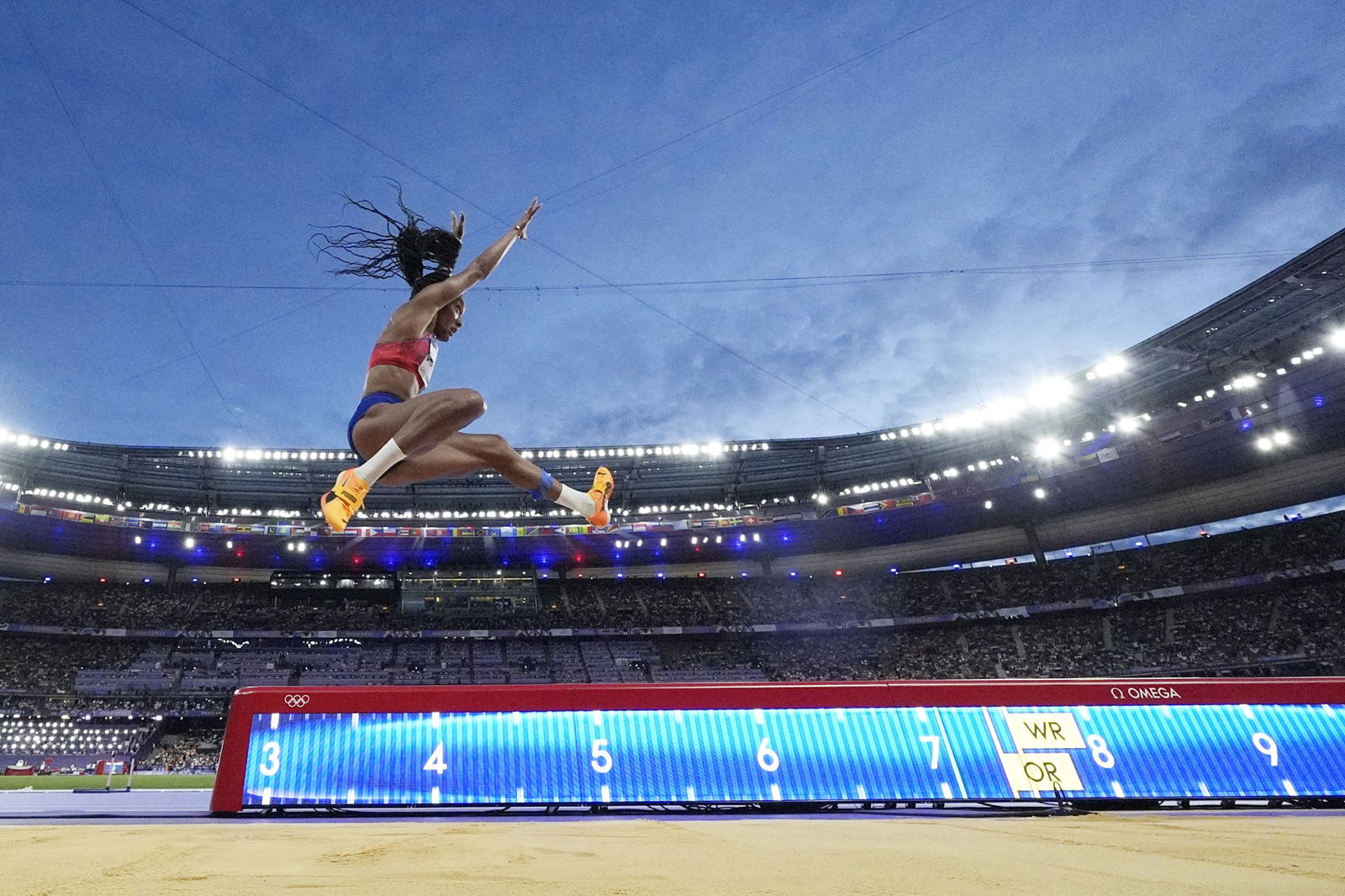 Tara Davis-Woodhall competes in the women's long jump final in Paris.