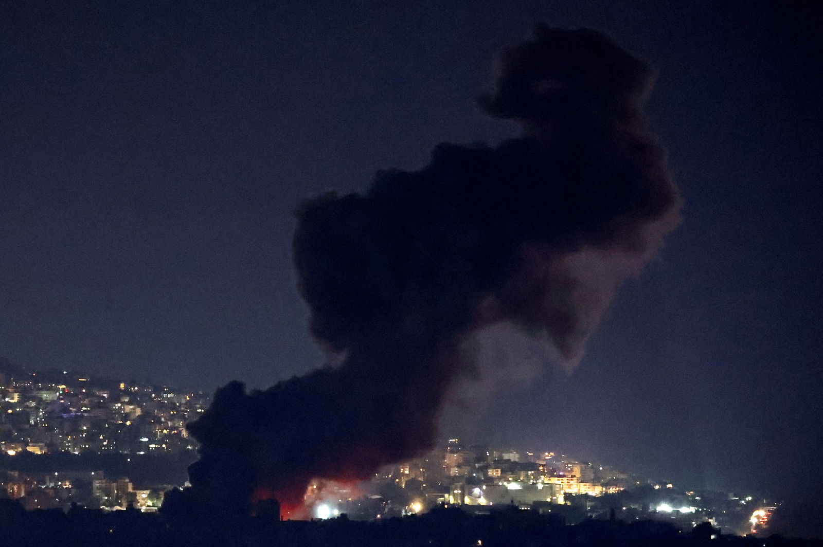 Smoke rises over Beirut's southern suburbs after a strike