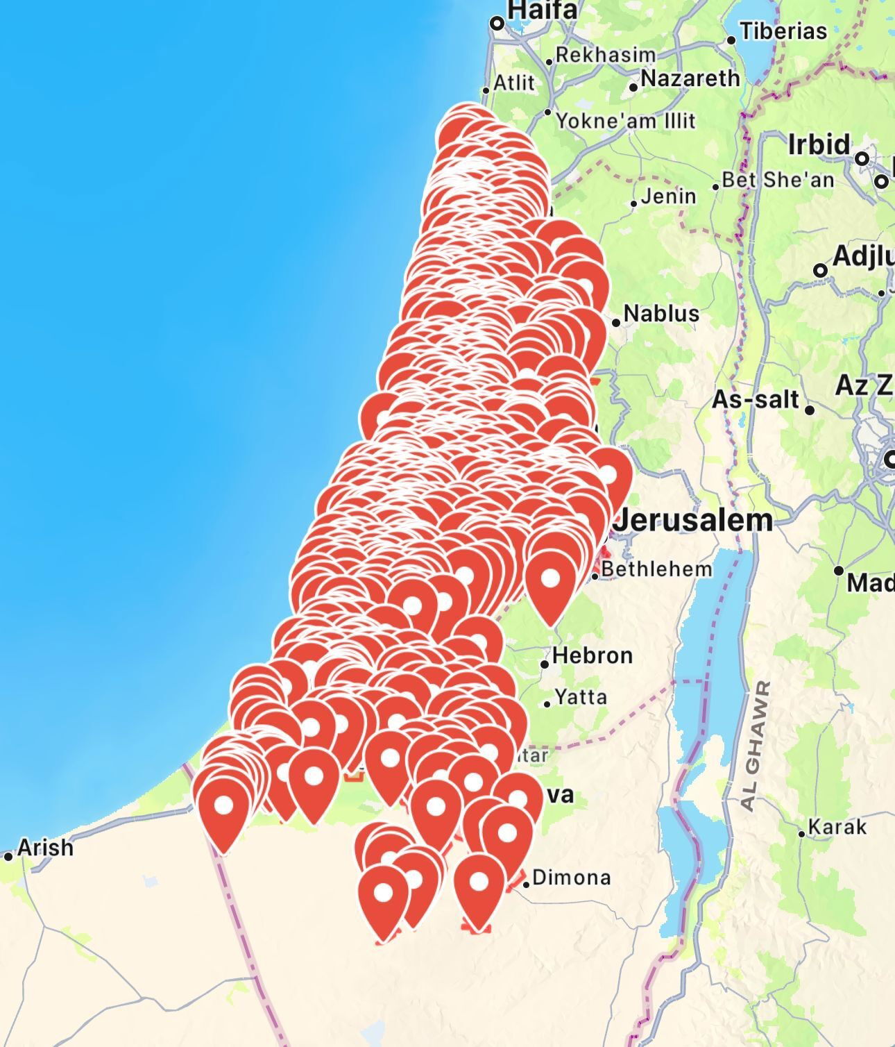 A map with multiple red dots on it indicating missiles