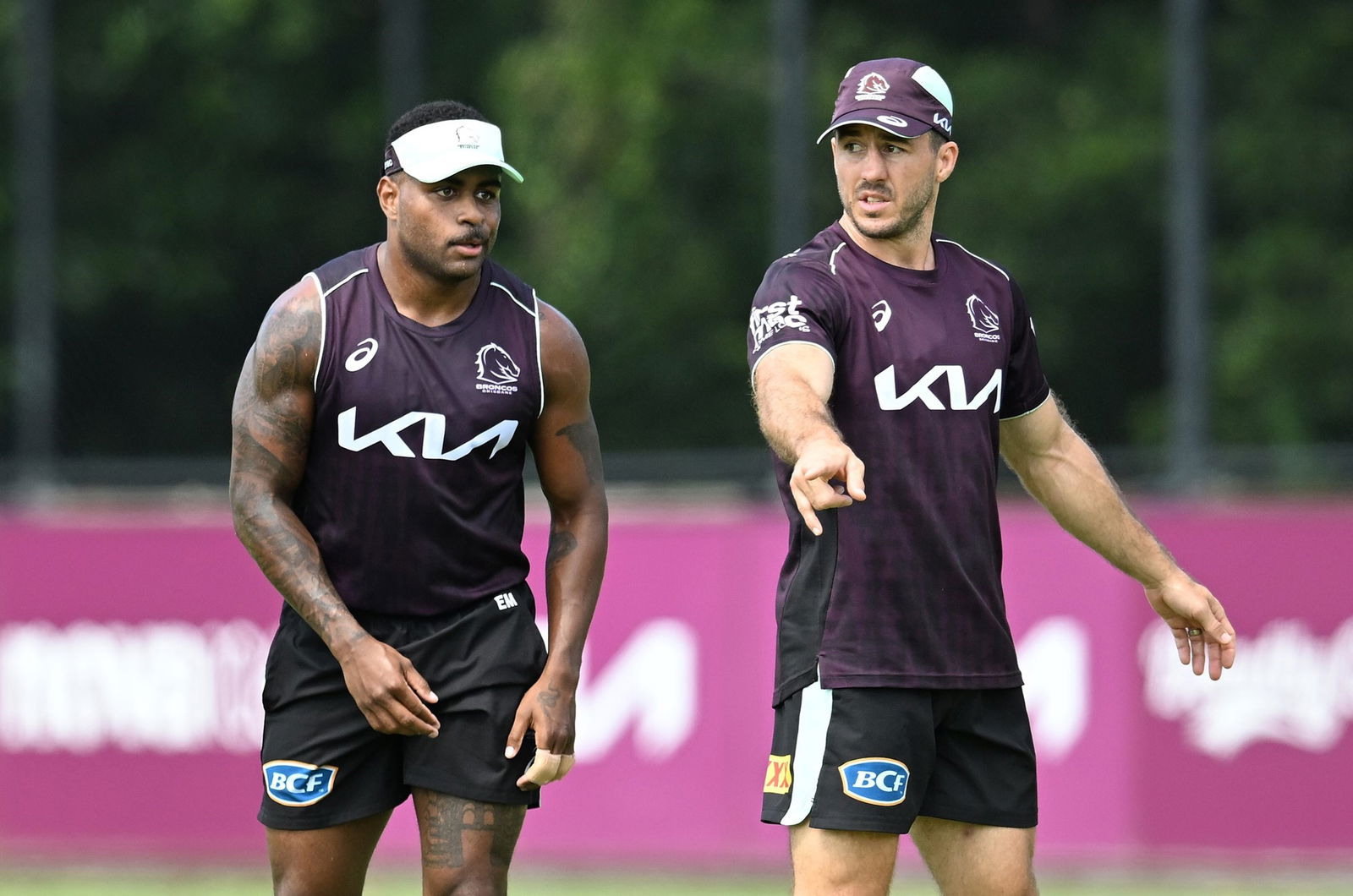 Ezra Mam (left) and Ben Hunt (right) are seen during a Brisbane Broncos NRL training session at Red Hill in Brisbane.