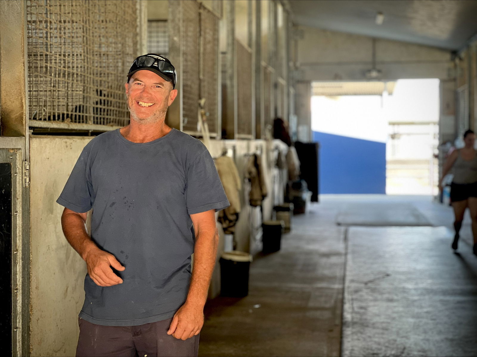 Scott Edwards standing in horse stables