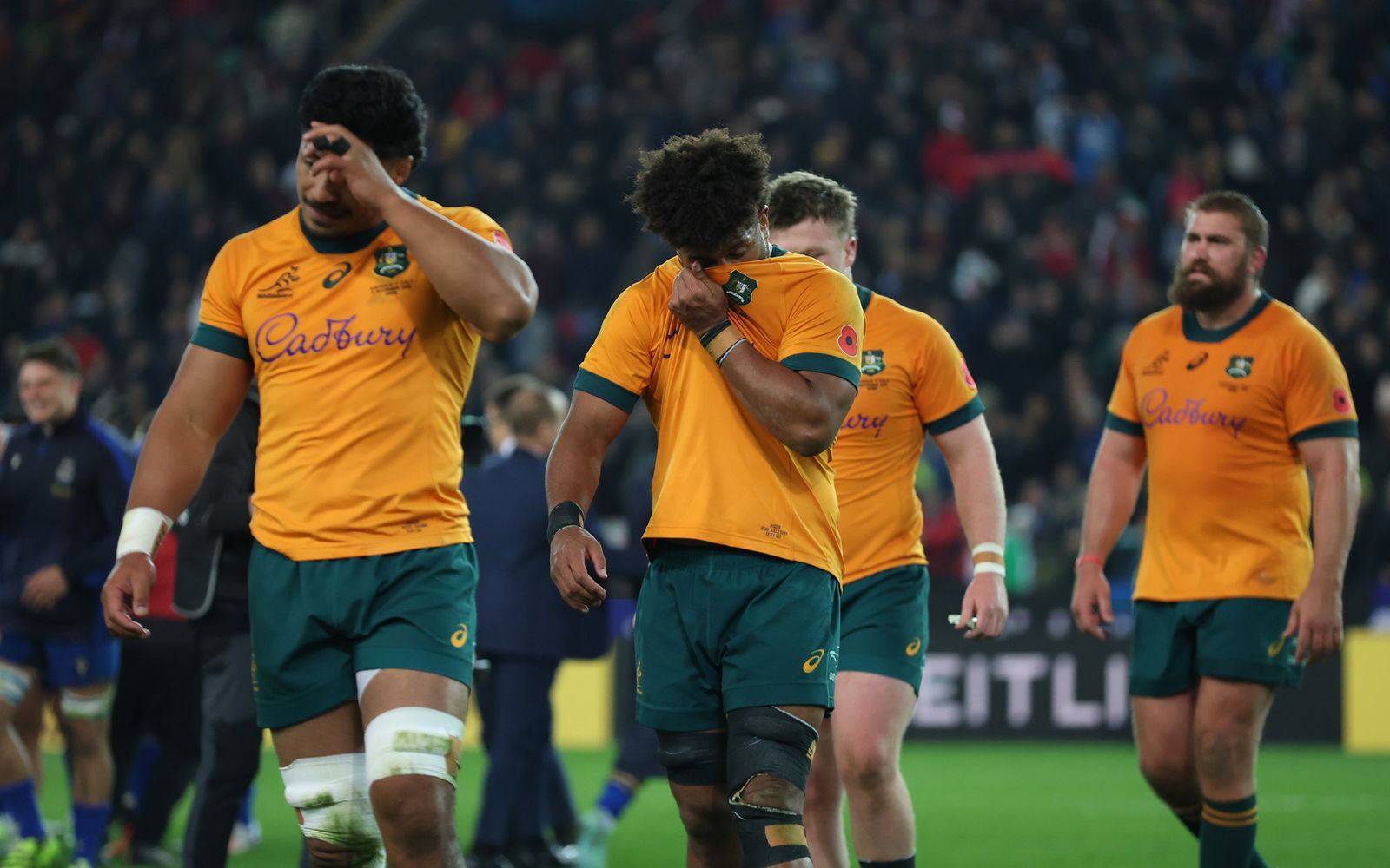 Os jogadores dos Wallabies parecem desanimados.