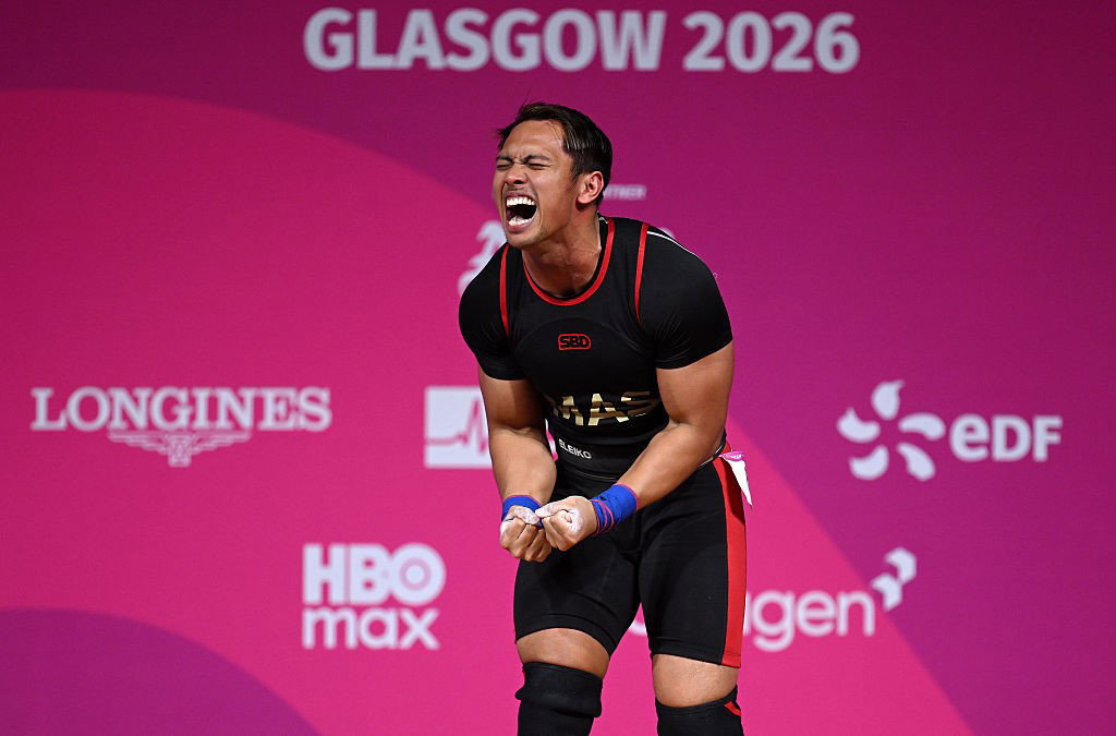  Erry Hidayat Muhammad of Team Malaysia celebrates a lift in the Men's 79kg Weightlifting on day four of the Glasgow 2026 Commonwealth Games