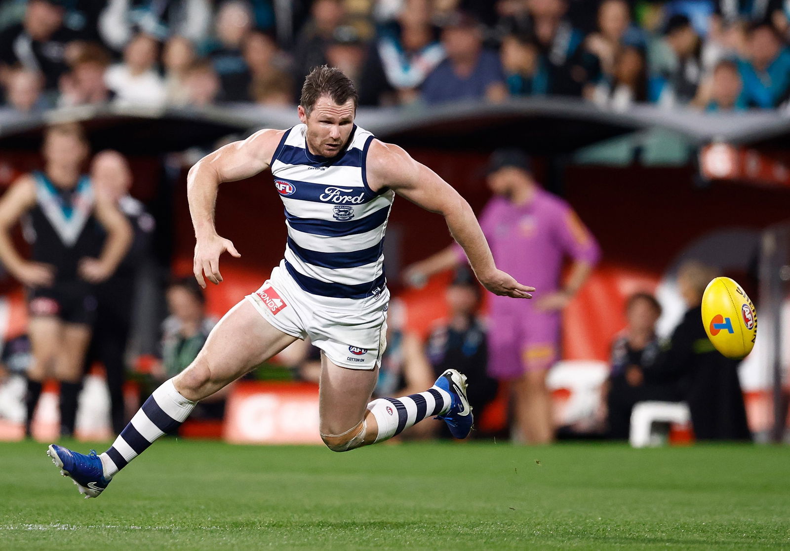 Patrick Dangerfield chases the ball