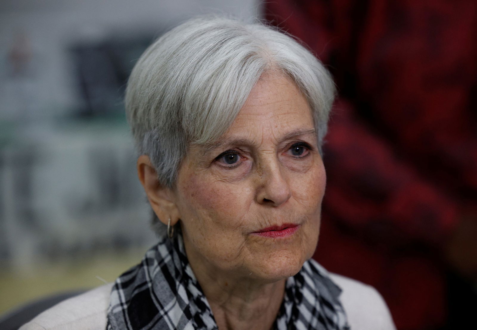 Jill Stein, a woman with short grey hair. 