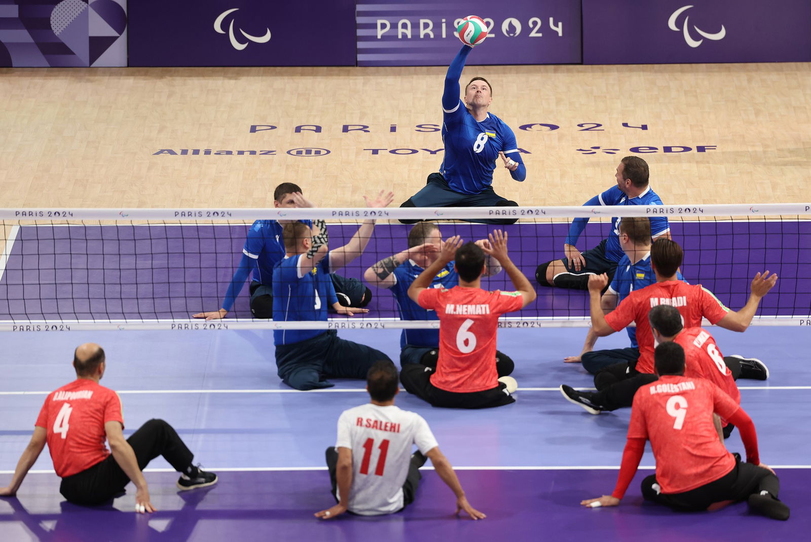 Ukraine's Roman Pryshchepa serves against Iran in their Pool B match in Paris.