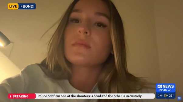 A young woman speaking on a video call